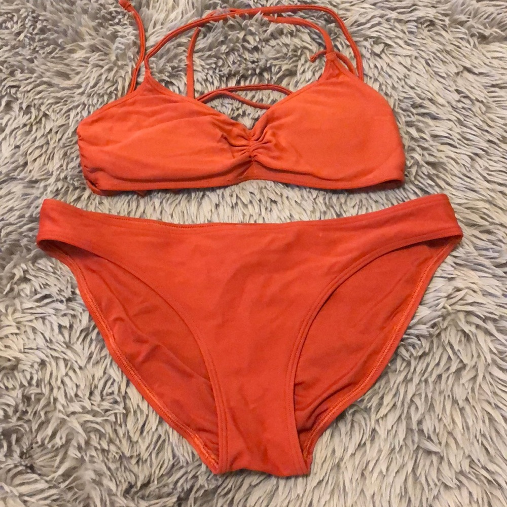Rust colored swimsuit.